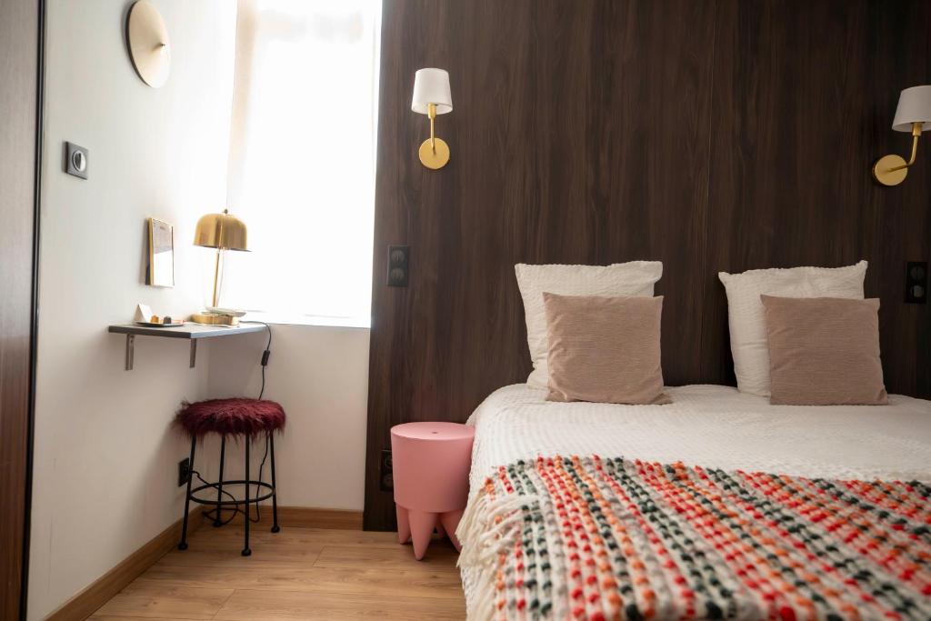 Postel nebo postele na pokoji v ubytování Rosie's Club