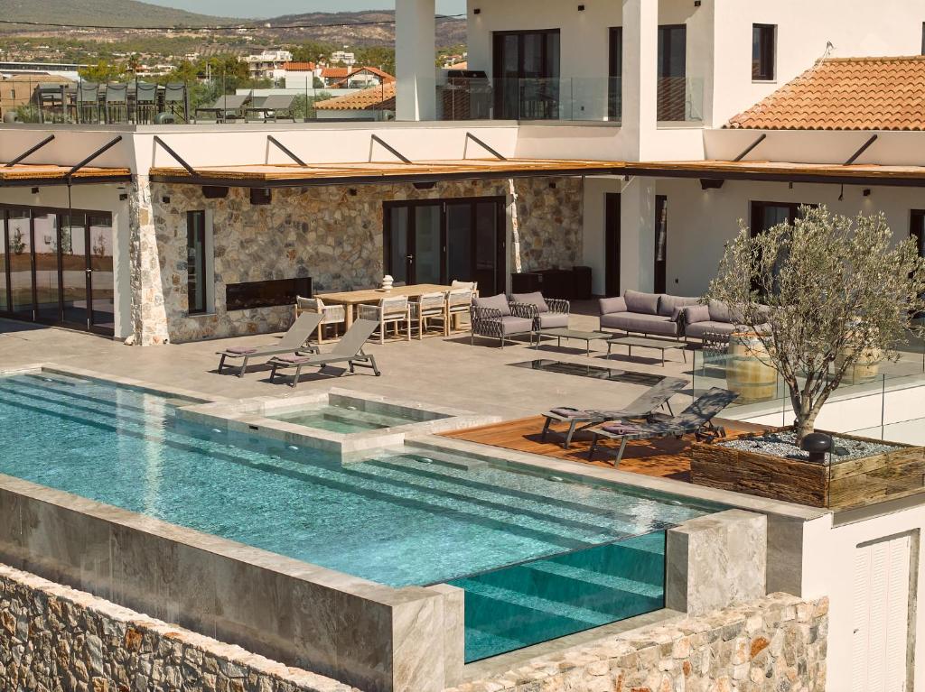 Πισίνα στο ή κοντά στο Kalonía Villa, a Quintessential Retreat, By ThinkVilla