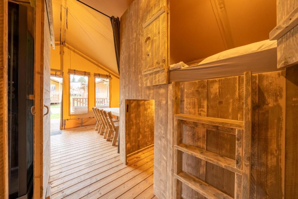 Postel nebo postele na pokoji v ubytování hu Birkelt village