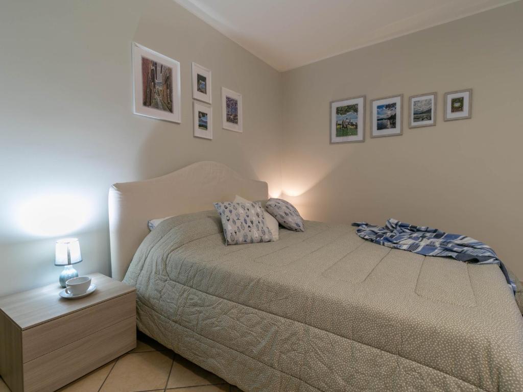 Ένα ή περισσότερα κρεβάτια σε δωμάτιο στο Welcomely - A Due Passi dal Lago