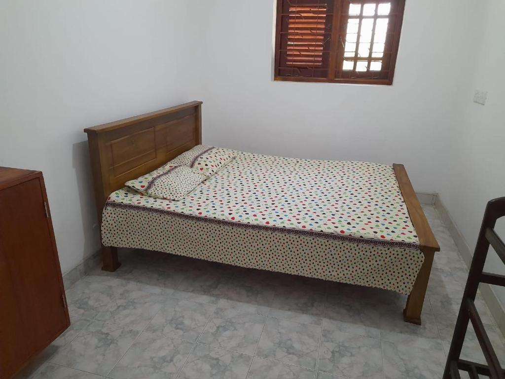 Postel nebo postele na pokoji v ubytování Hostal Gang