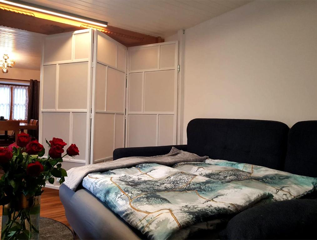 Postel nebo postele na pokoji v ubytování Ferienhaus TraunseeStrand