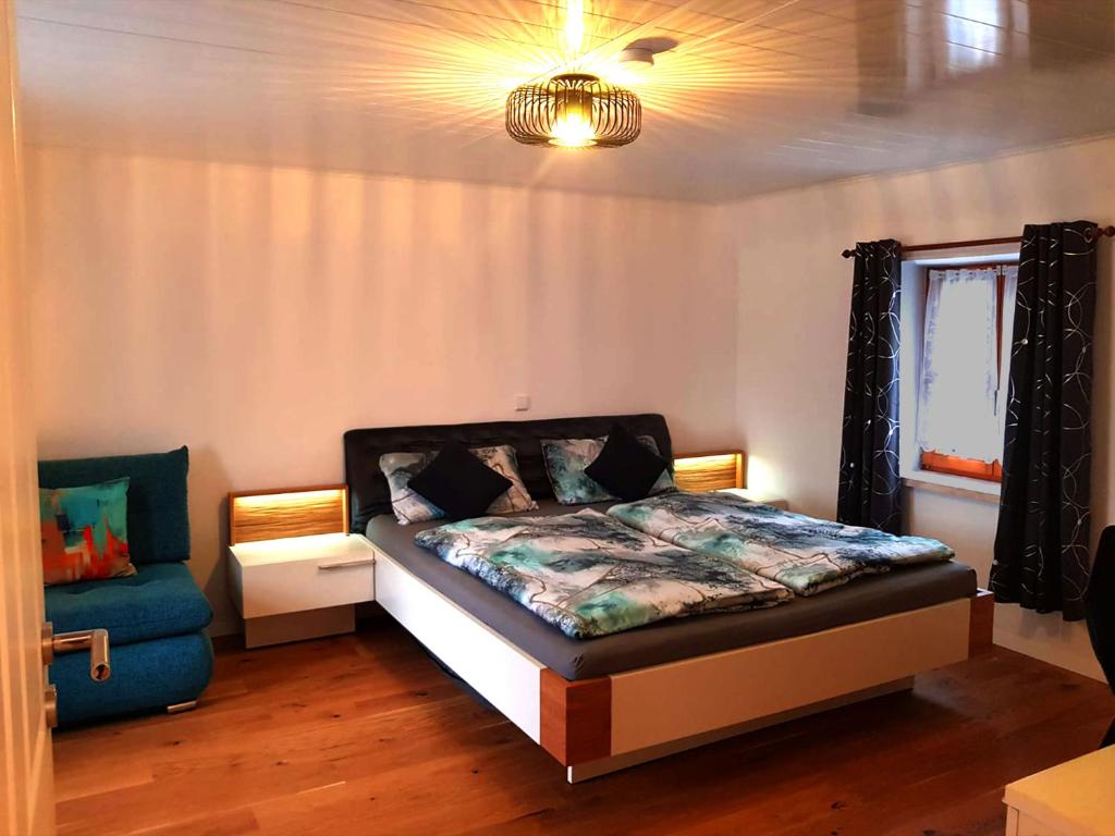 Postel nebo postele na pokoji v ubytování Ferienhaus TraunseeStrand
