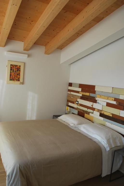 Postel nebo postele na pokoji v ubytování OrtoPì Country Canapa House