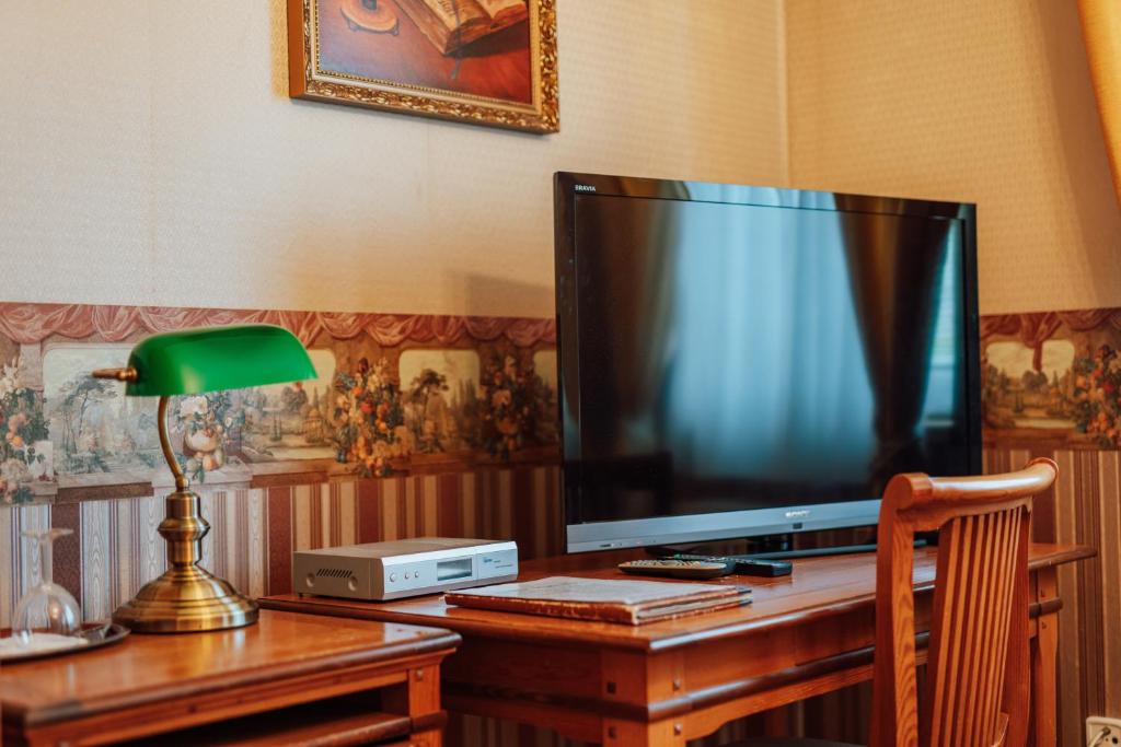TV a/nebo společenská místnost v ubytování Penzion Bene