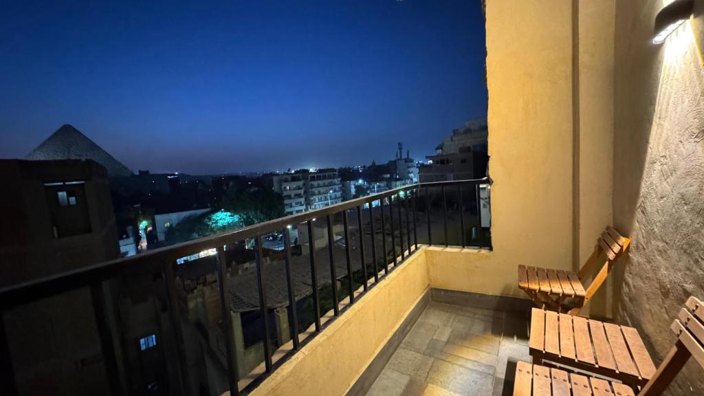 Balkón nebo terasa v ubytování Konooz Pyramids Hotel