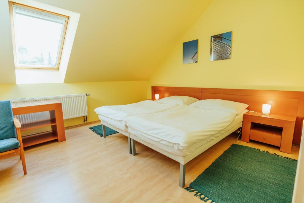 Postel nebo postele na pokoji v ubytování Penzion Bene