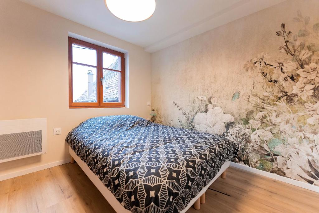 Postel nebo postele na pokoji v ubytování Zellenberg - Gite d'Ela