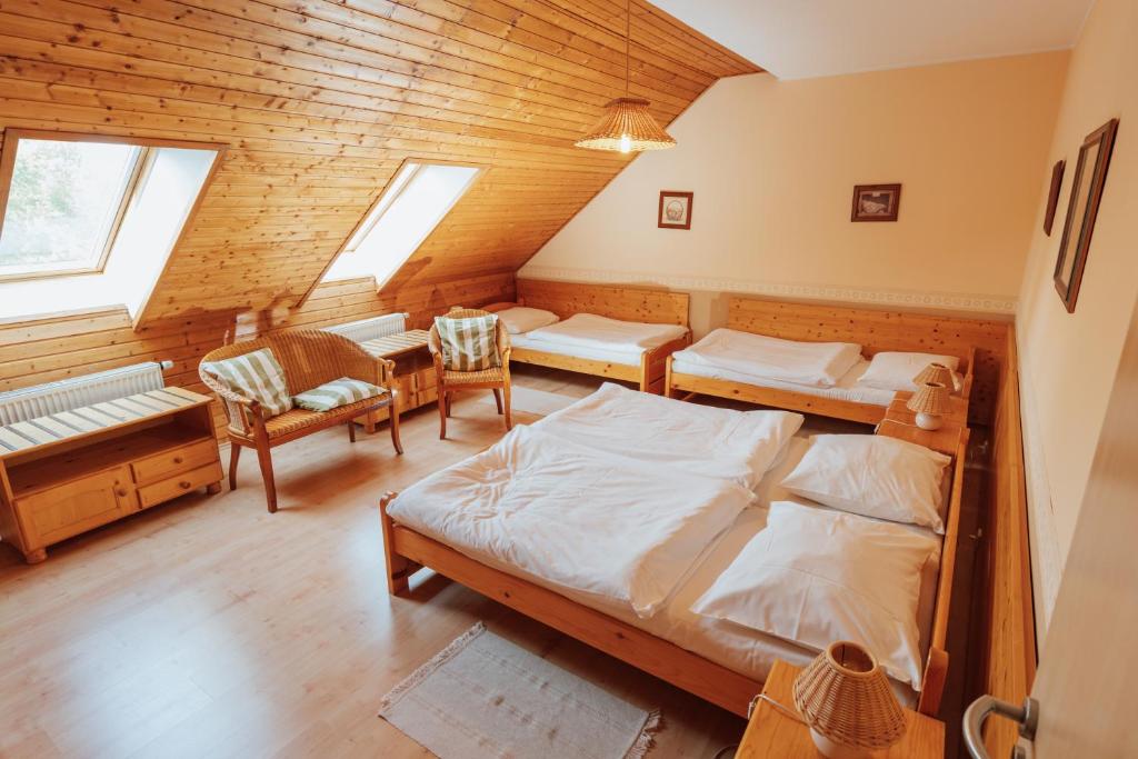 Postel nebo postele na pokoji v ubytování Penzion Bene