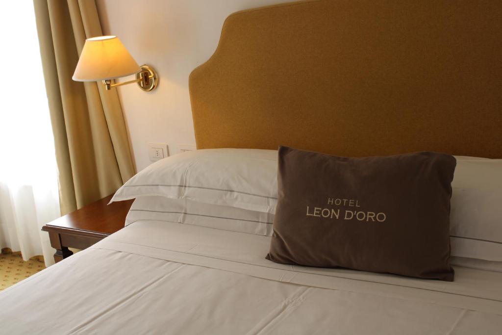 Posteľ alebo postele v izbe v ubytovaní Cora Hotels Leon d'Oro