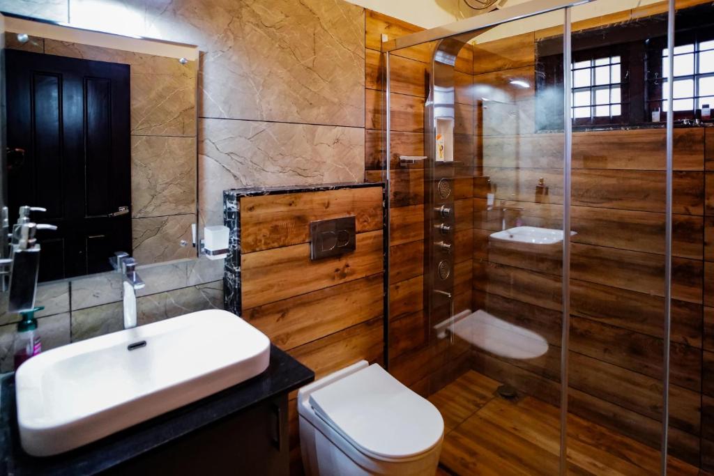 Koupelna v ubytování Jathikka Homestay