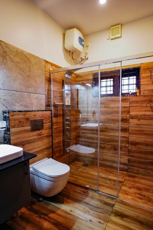 Koupelna v ubytování Jathikka Homestay