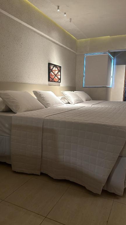 Postel nebo postele na pokoji v ubytování Loft 1 Edf celita Franca Business hotel