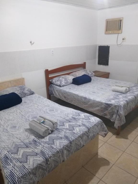 Postel nebo postele na pokoji v ubytování Hotel Primu's