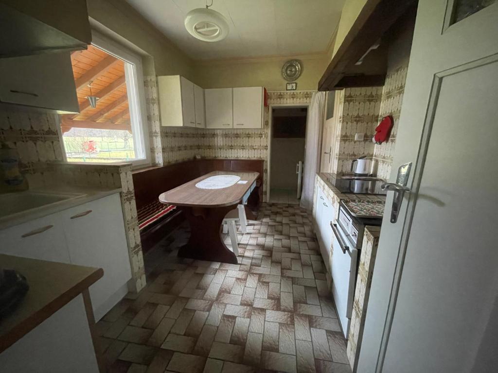 Kuchyň nebo kuchyňský kout v ubytování Aux Portes Du Parc