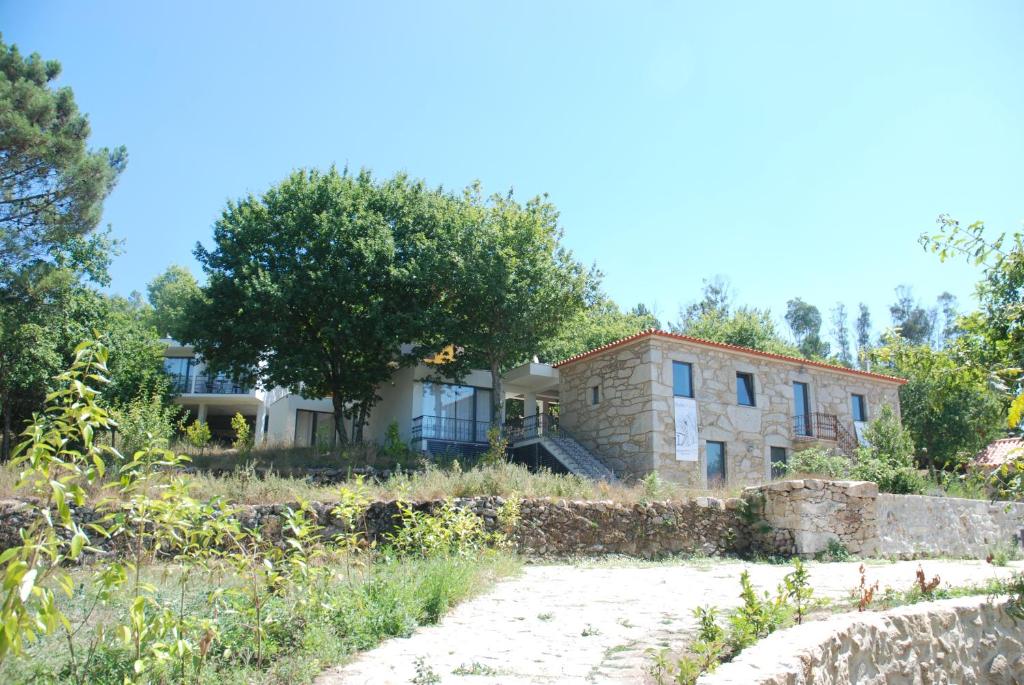 a house in the middle of a field at Trebid'Ouro in Vale de Cambra