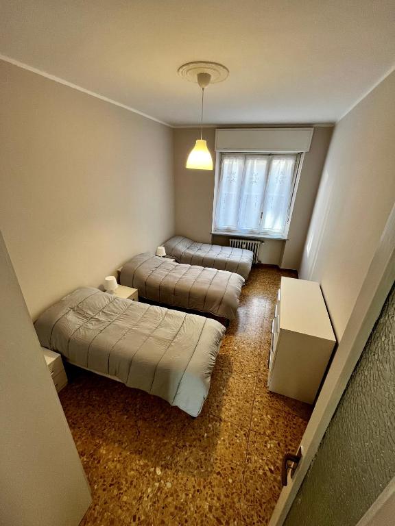 Postel nebo postele na pokoji v ubytování Porta Navina