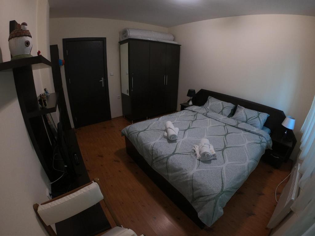 Postel nebo postele na pokoji v ubytování Apartment Atanasov - Pamporovo