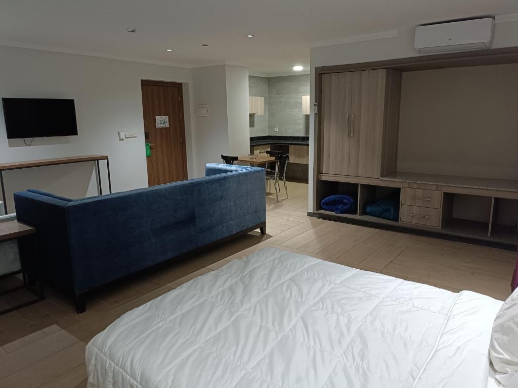 Postel nebo postele na pokoji v ubytování HOTEL Dar Al Oumda