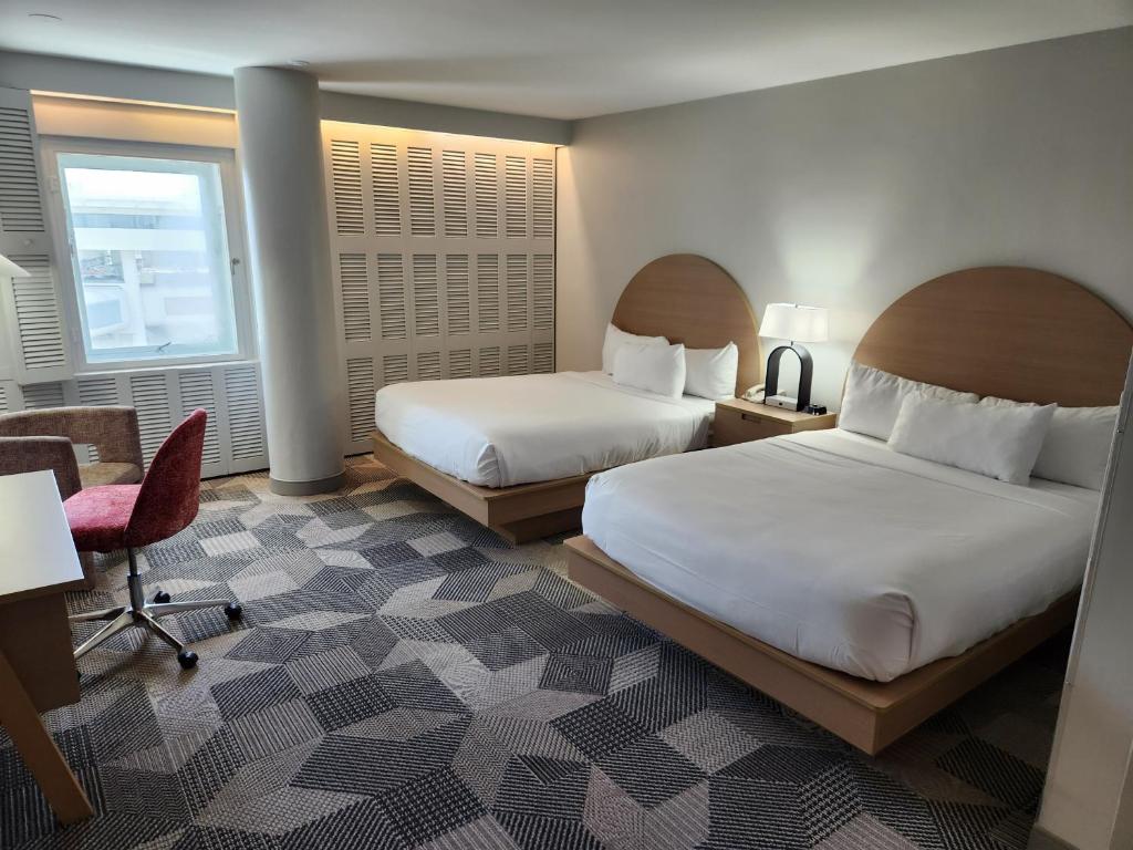 Krevet ili kreveti u jedinici u objektu Miami International Airport Hotel