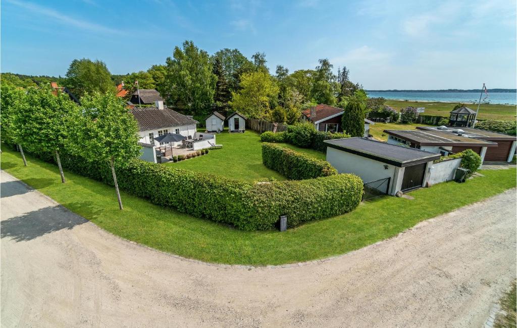 an aerial view of a house with a yard at 3 Bedroom Gorgeous Home In Ebeltoft in Ebeltoft