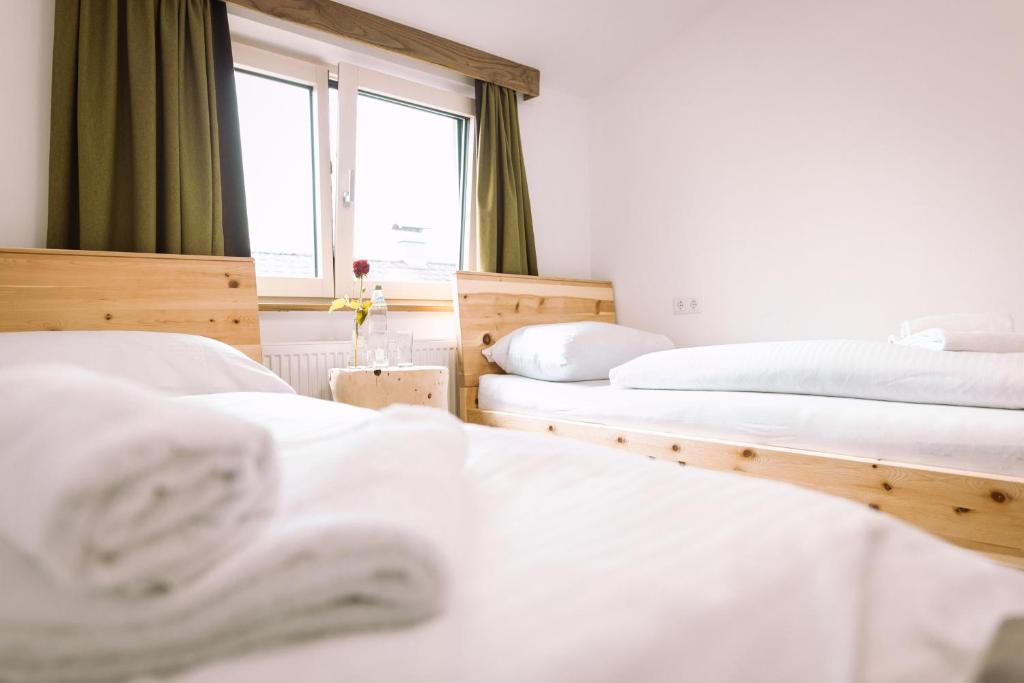 Postel nebo postele na pokoji v ubytování Landgasthof Rechenwirt