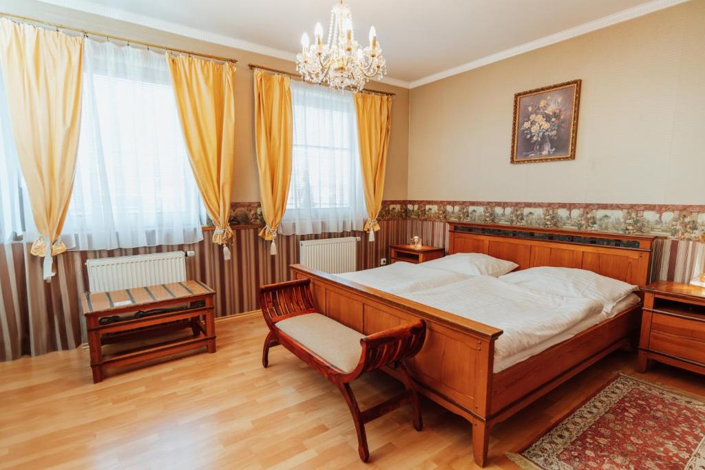 Postel nebo postele na pokoji v ubytování Penzion Bene