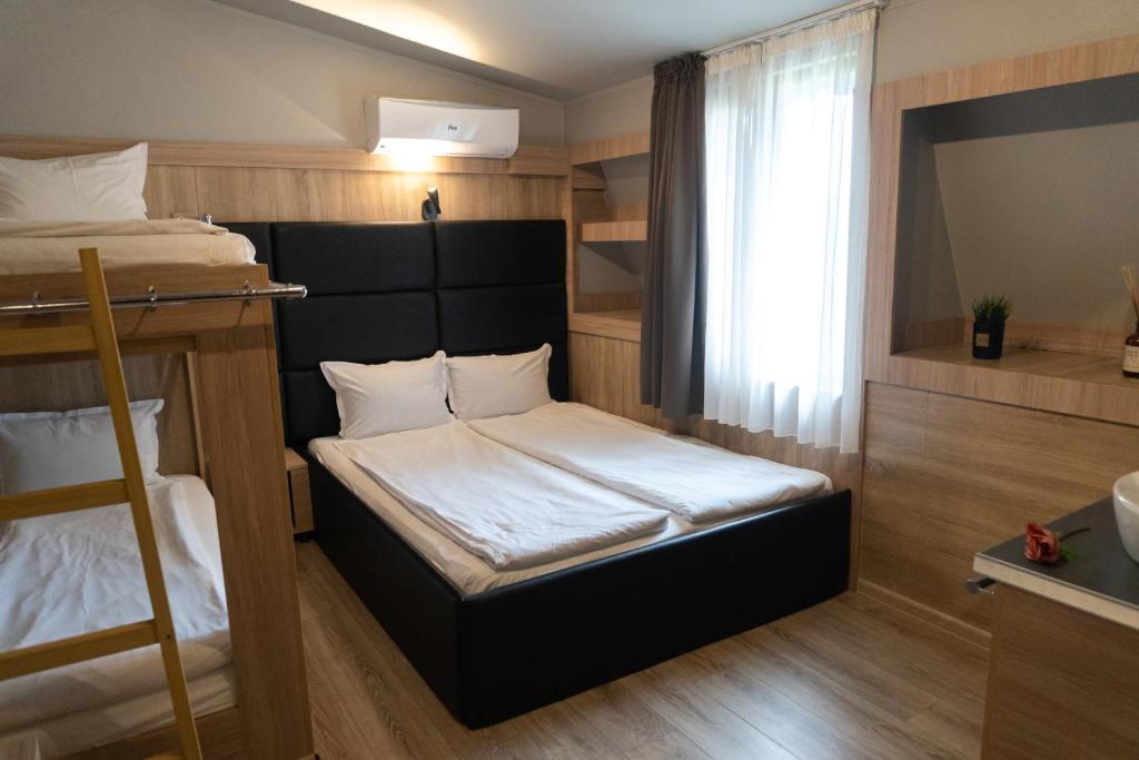 Postel nebo postele na pokoji v ubytování Hotel Allur