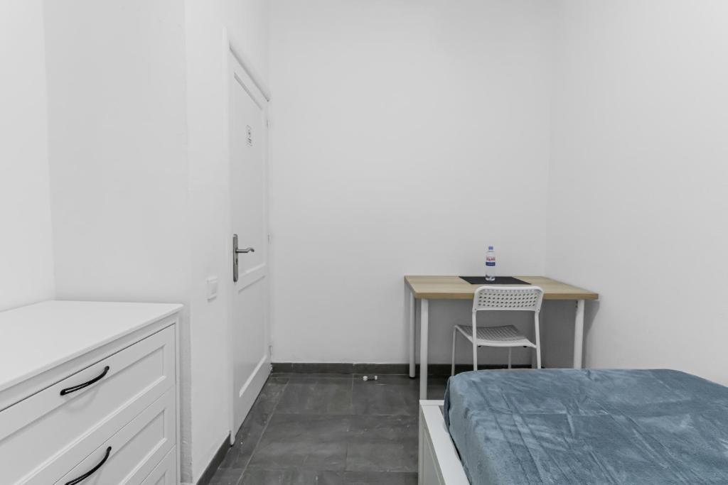 Postel nebo postele na pokoji v ubytování Urban Nest Suites