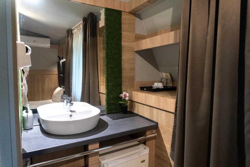 Kuchyň nebo kuchyňský kout v ubytování Hotel Allur