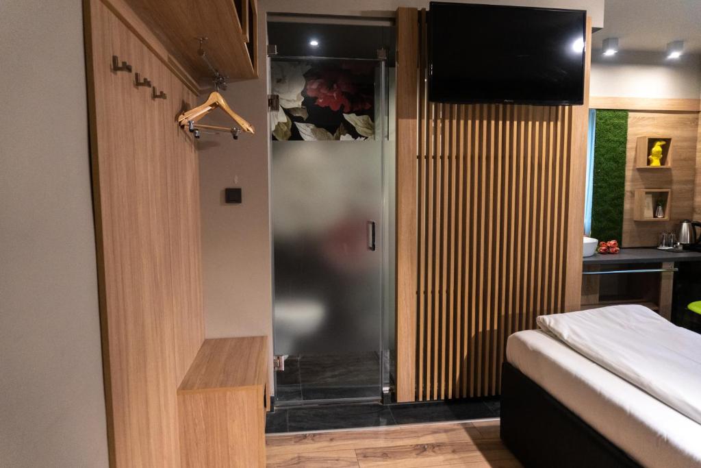Postel nebo postele na pokoji v ubytování Hotel Allur