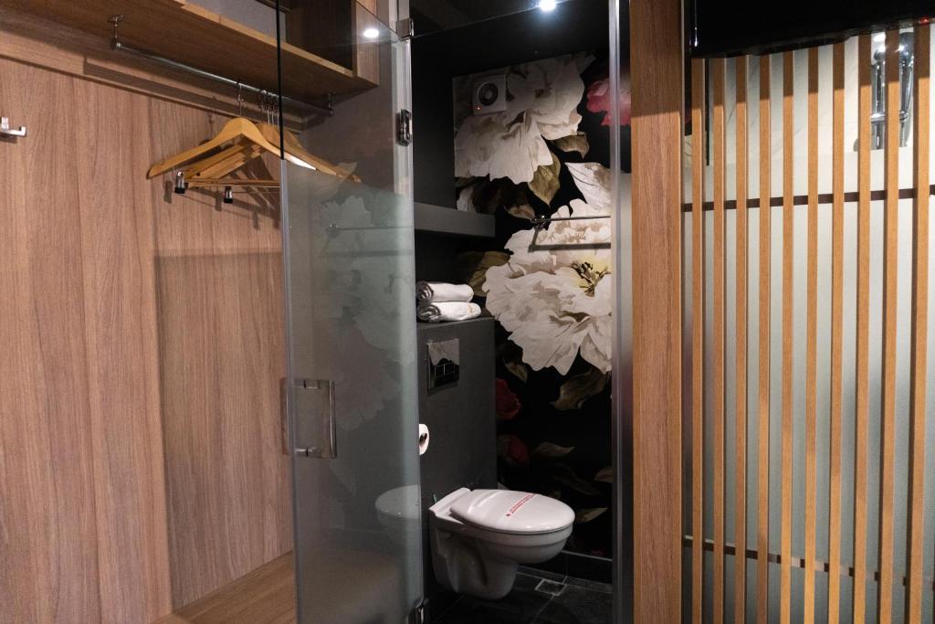 Koupelna v ubytování Hotel Allur