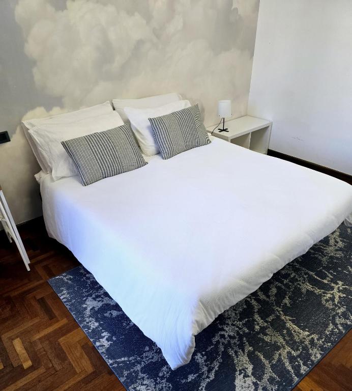 Postel nebo postele na pokoji v ubytování Orio Welcome