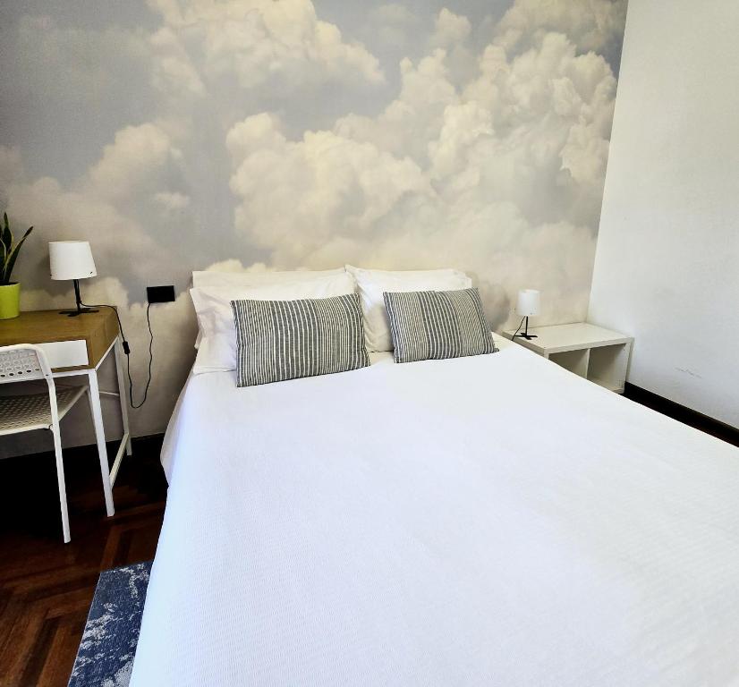 Postel nebo postele na pokoji v ubytování Orio Welcome