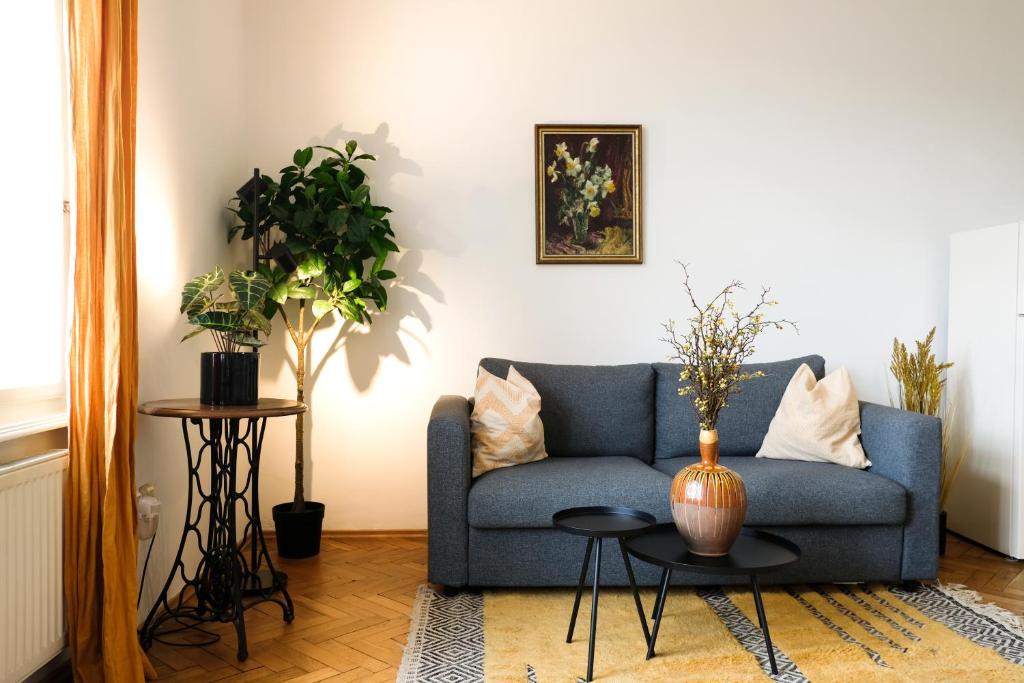 Predel za sedenje v nastanitvi Zentrales und stilvolles Apartment mit Parkplatz - Schlossbergblick