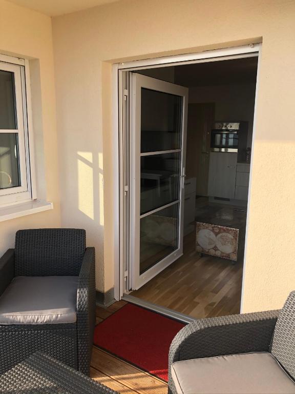 Posezení v ubytování Stilvolle Ferien-Geschäftswohnung Brandenburger Seenlandschaft