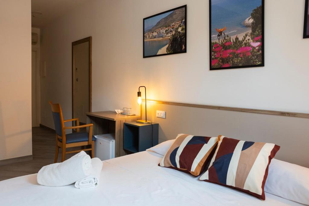 Postel nebo postele na pokoji v ubytování Sperlonga Center Holiday