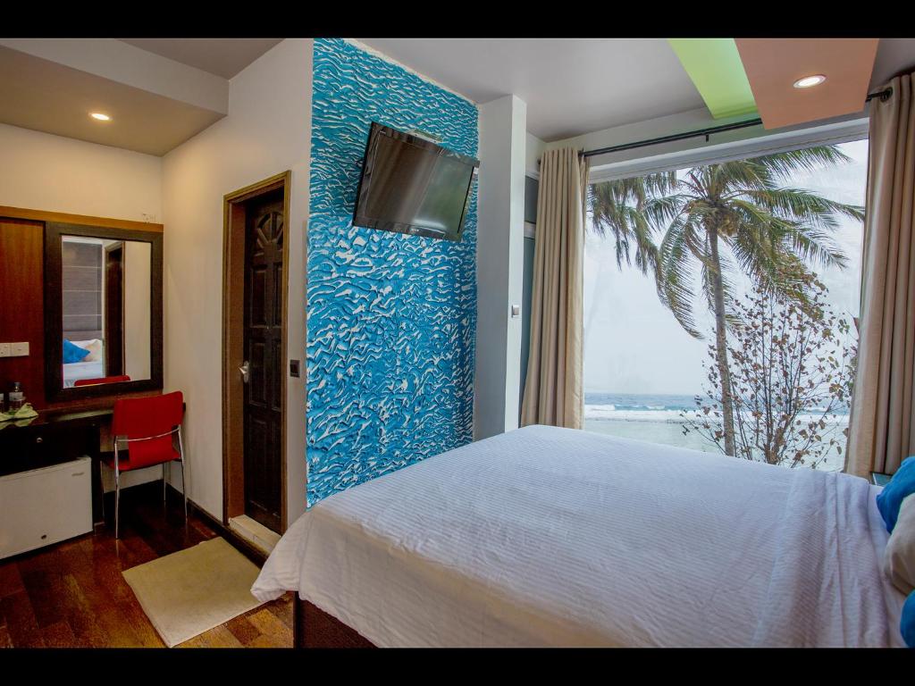 TV a/nebo společenská místnost v ubytování Ripple Beach Inn