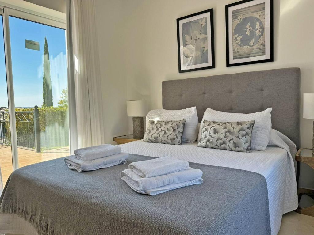 Postel nebo postele na pokoji v ubytování Villa Los Olivos - Ole Solutions