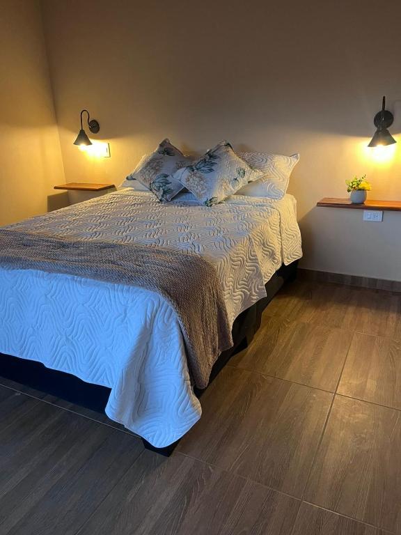 Postel nebo postele na pokoji v ubytování Cabañas Alondra