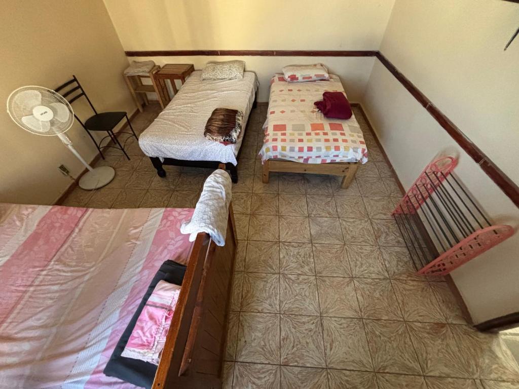 Postel nebo postele na pokoji v ubytování Hostal 509