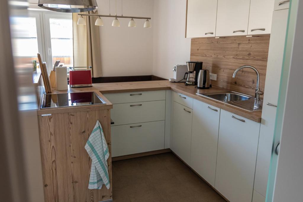 Kuchyň nebo kuchyňský kout v ubytování Ferienwohnung Eisl