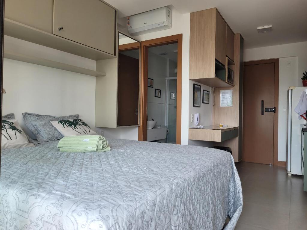 Postel nebo postele na pokoji v ubytování Lindo Studio ZN Barra