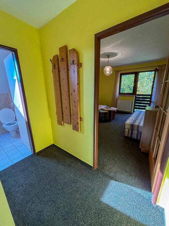 Postel nebo postele na pokoji v ubytování Dum Eva