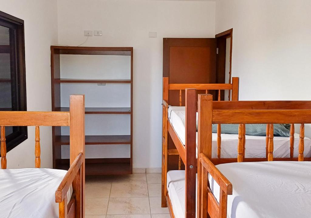 Postel nebo postele na pokoji v ubytování Pousada Nereidas