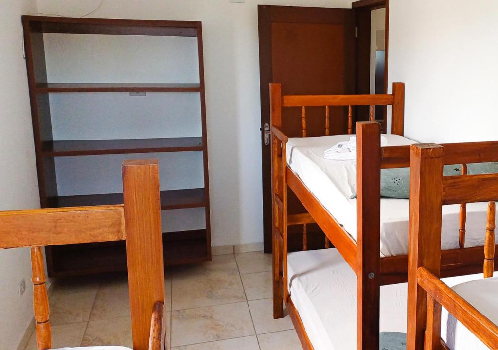 Postel nebo postele na pokoji v ubytování Pousada Nereidas