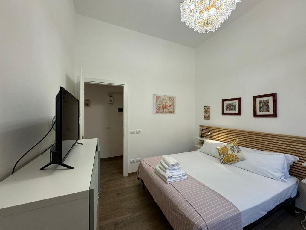 A television and/or entertainment centre at Casa Marin - Metro Malatesta