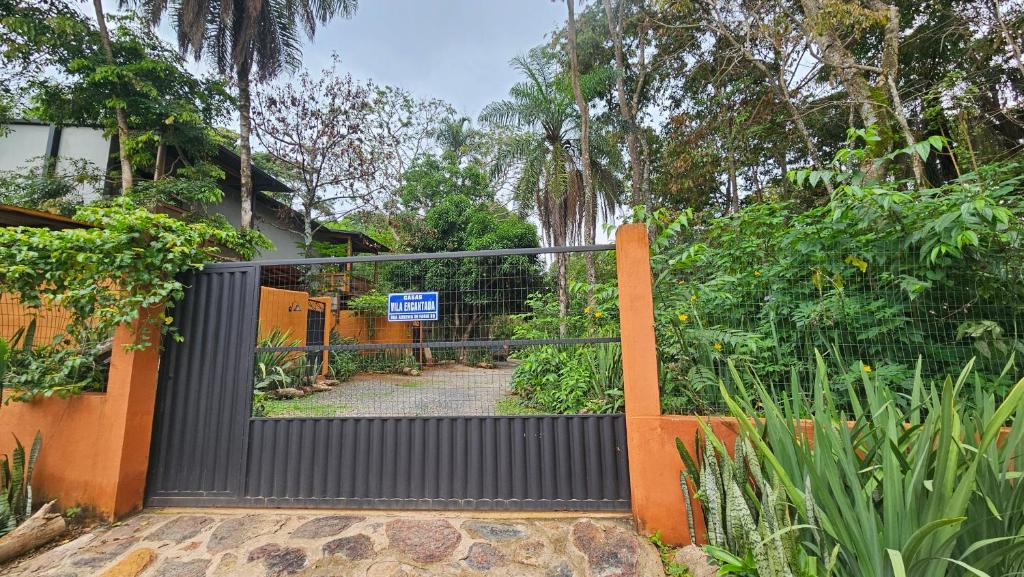 Zahrada ubytování Casas Vila Encantada Refúgio, conforto e natureza, apenas 2 min da avenida