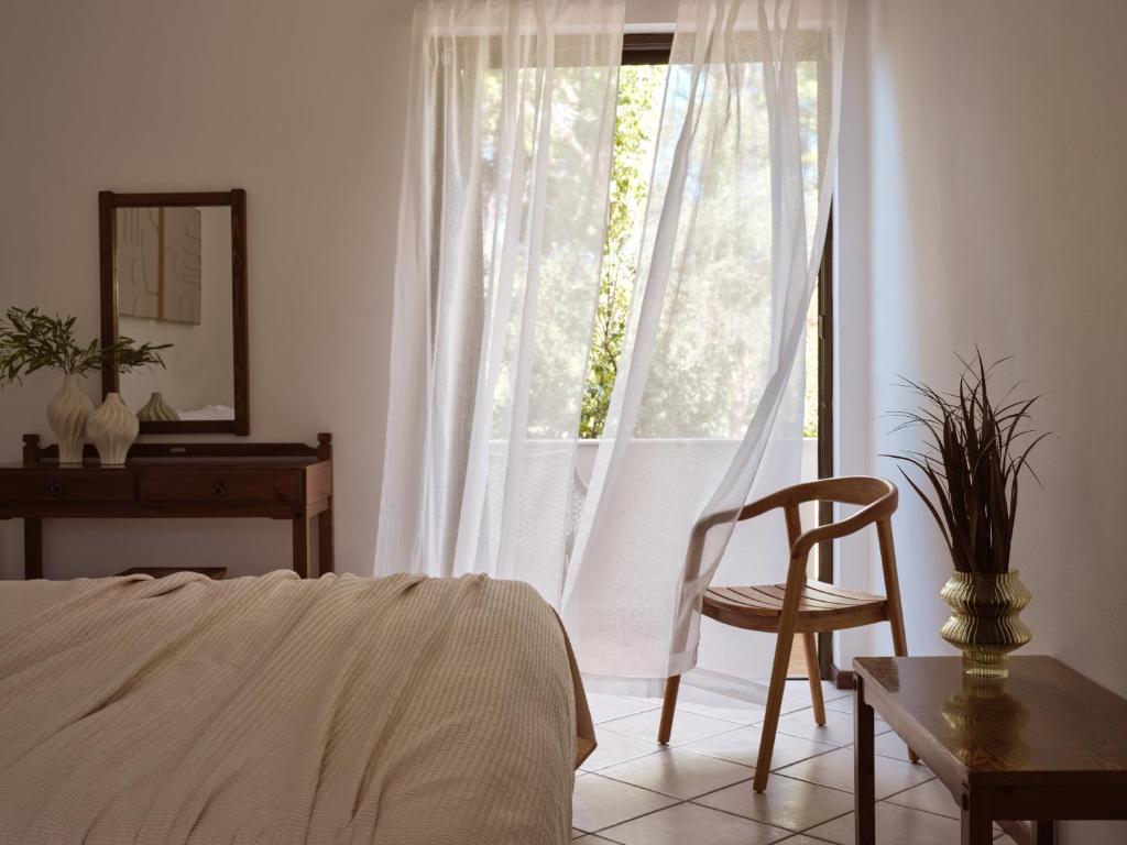 Ein Bett oder Betten in einem Zimmer der Unterkunft AQUARIUS HOTEL