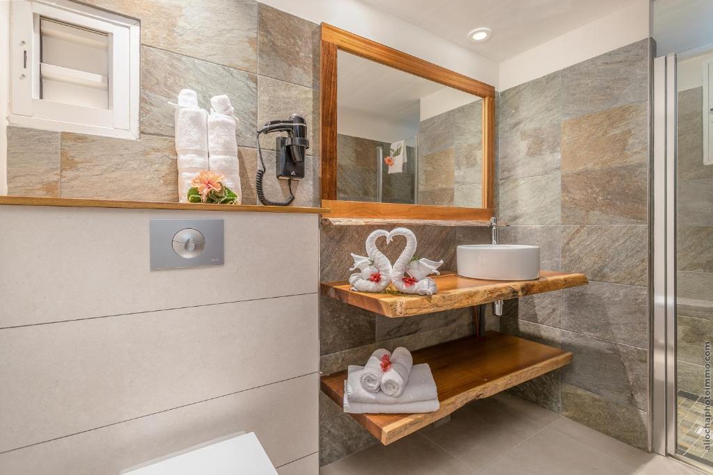 Koupelna v ubytování Courbaril Hôtel